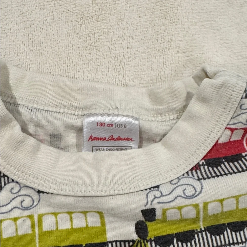 HANNA ANDERSON pajama sets. Size 8. Trains and Christmas construction vehicles. - Picture 3 of 5